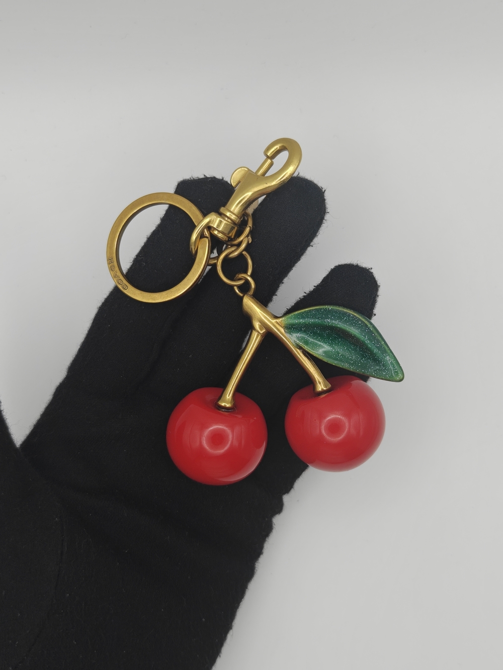 Coach Red Cherry Bag Charm Keychain with Green Leaf and Gold Hardware - Picture 4 of 4